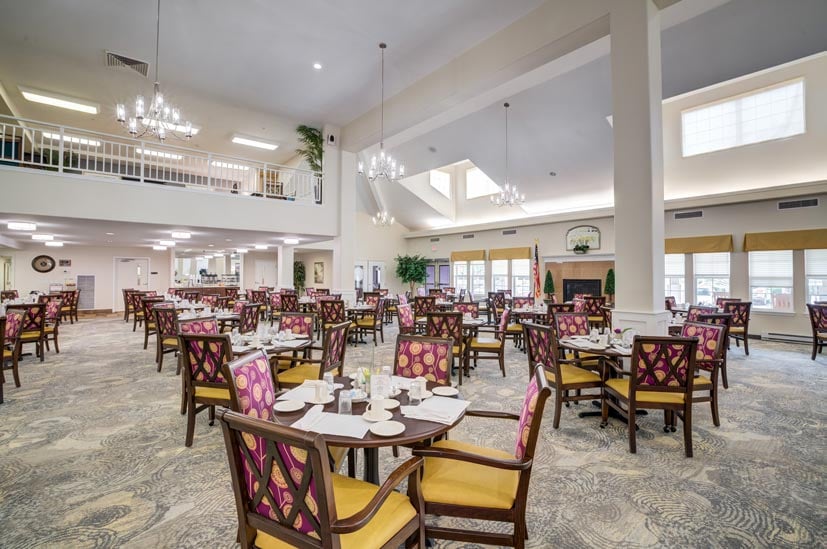The dining room at Steeplechase set for mealtime