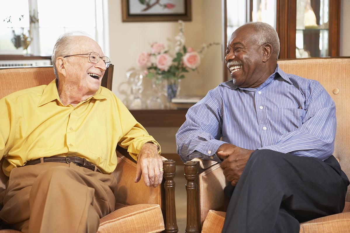 Residents laughing together at Steeplechase